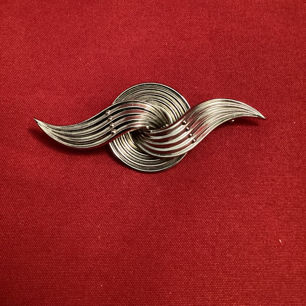 Triad Silver tone abstract brooch